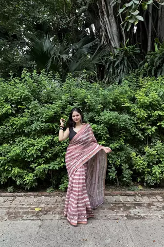 Pink striped linen blend saree with blouse piece