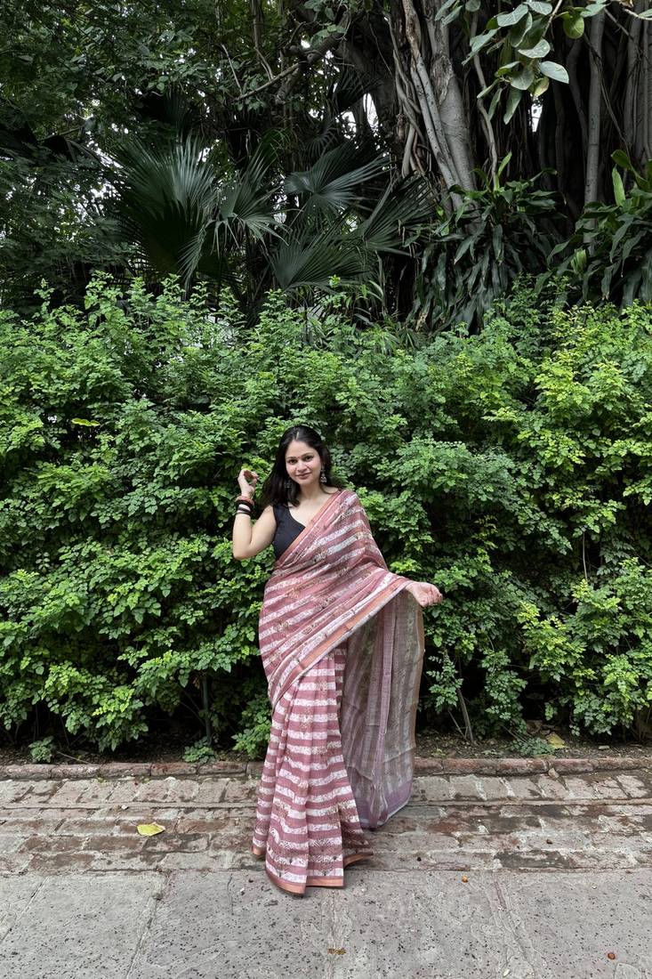 Pink striped linen blend saree with blouse piece
