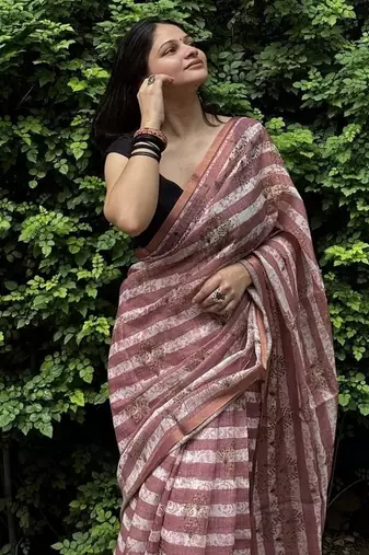 Pink striped linen blend saree with blouse piece