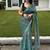 Green floral linen blend saree with blouse piece