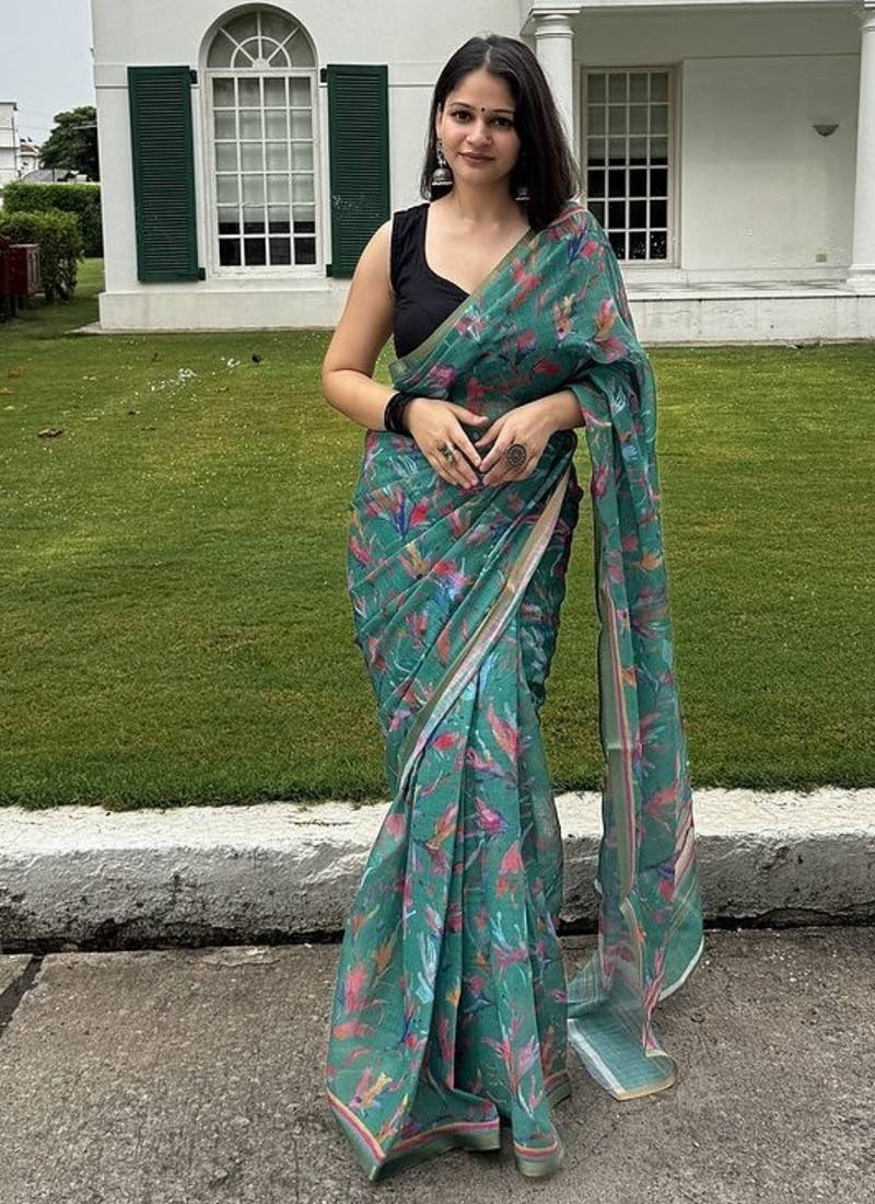 Green floral linen blend saree with blouse piece