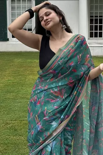 Green floral linen blend saree with blouse piece