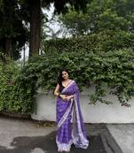 Purple checked linen blend saree with blouse piece