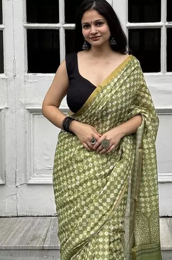 Green checked linen blend saree with blouse piece