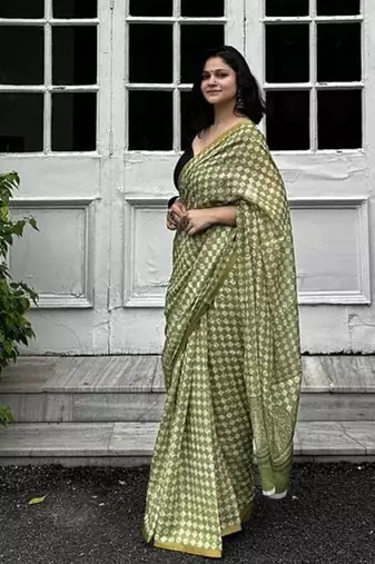 Green checked linen blend saree with blouse piece
