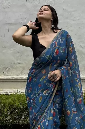 Blue floral linen blend saree with blouse piece