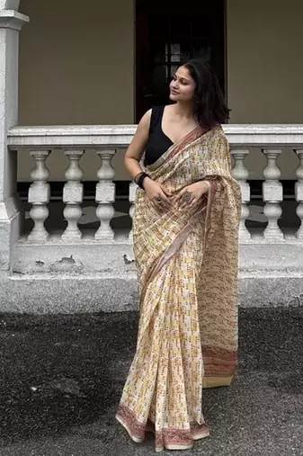 Yellow checked linen blend saree with blouse piece