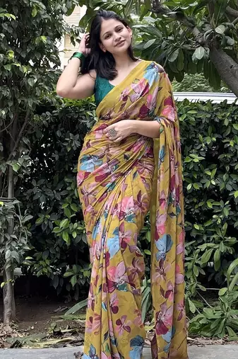 Mustard floral printed georgette saree with blouse piece