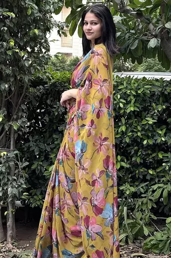 Mustard floral printed georgette saree with blouse piece