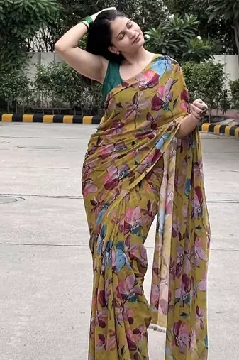 Mustard floral printed georgette saree with blouse piece