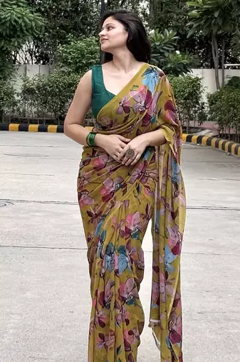 Mustard floral printed georgette saree with blouse piece