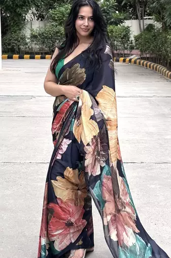 Black floral georgette saree with blouse piece