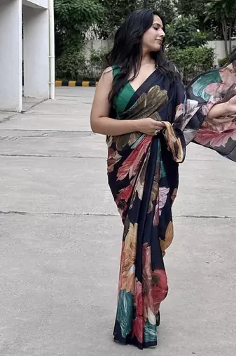 Black floral georgette saree with blouse piece