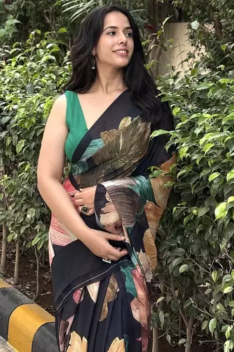 Black floral georgette saree with blouse piece