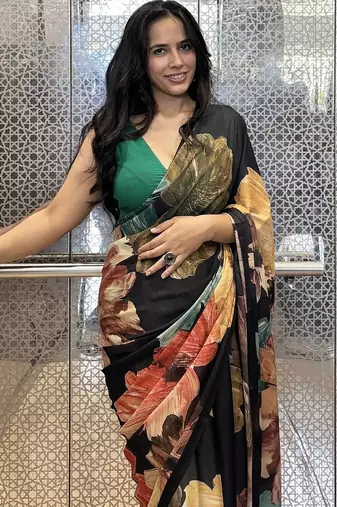Black floral georgette saree with blouse piece