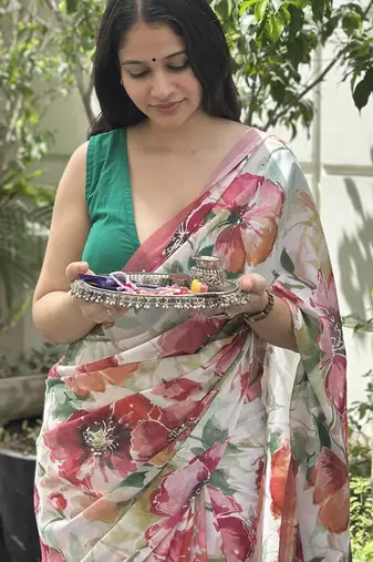 White floral printed georgette saree with blouse piece