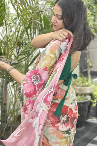 White floral printed georgette saree with blouse piece