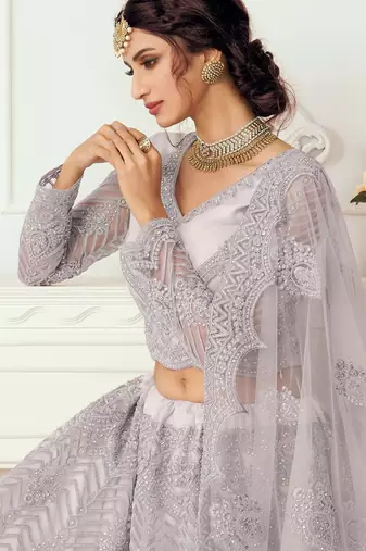 Lavender Embroidered Net Stone Work Lehenga Choli - Free size