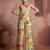 Elegant green muslin cord set with vibrant floral print
