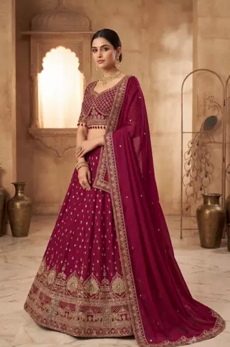 Maroon Bridal Lehenga Choli with Heavy Gold Embroidery & Dupatta