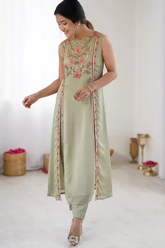 Elegant pista green georgette embroidered straight kurta with coordinated tapered pants set