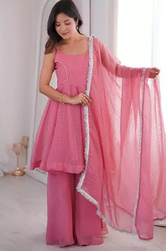 Women pink embellished peplum kurti sharara set with scallop border dupatta