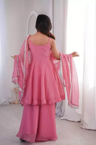 Women pink embellished peplum kurti sharara set with scallop border dupatta