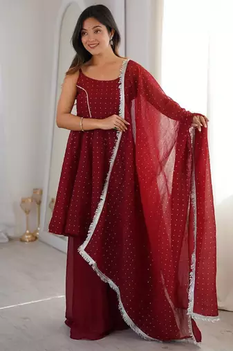 Women red embellished peplum kurti sharara set with scallop border dupatta