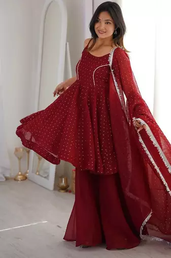 Women red embellished peplum kurti sharara set with scallop border dupatta