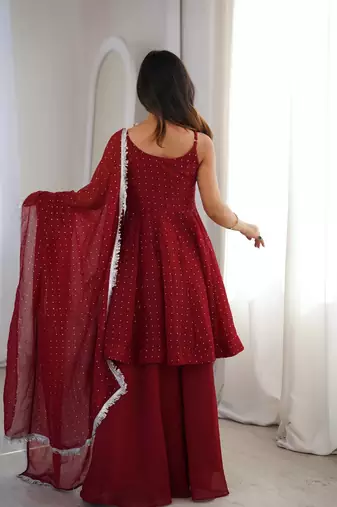 Women red embellished peplum kurti sharara set with scallop border dupatta