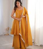 Women yellow embellished peplum kurti sharara set with scallop border dupatta