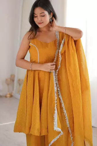 Women yellow embellished peplum kurti sharara set with scallop border dupatta