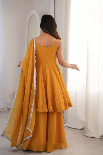 Women yellow embellished peplum kurti sharara set with scallop border dupatta