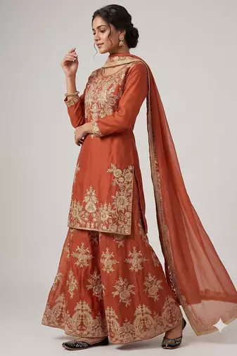 Women ethnic orange heavy embroidered kurti palazzo suit with dupatta