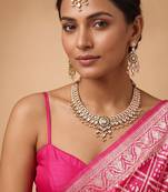 Gold plated white stones kundan necklace set with maang tikka
