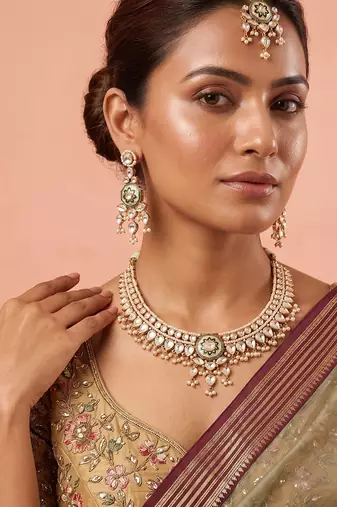 Gold plated white stones kundan necklace set with maang tikka
