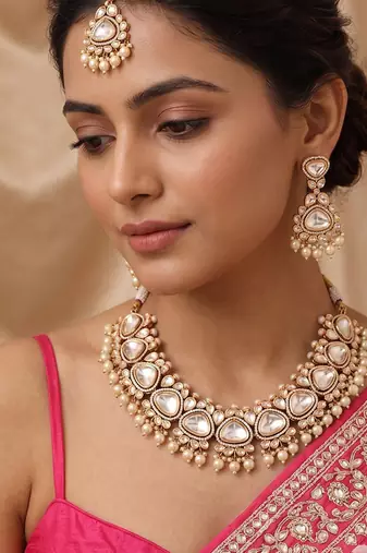Gold plated white stones polki kundan necklace set with maang tikka