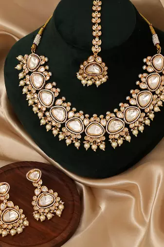 Gold plated white stones polki kundan necklace set with maang tikka