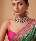 Gold plated maroon kundan choker necklace set with maang tikka