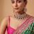 Gold plated maroon kundan choker necklace set with maang tikka