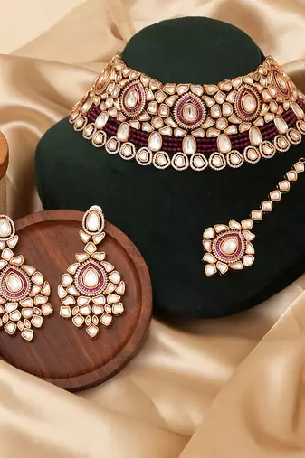 Gold plated maroon kundan choker necklace set with maang tikka