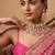 Gold plated light pink kundan choker necklace set with maang tikka