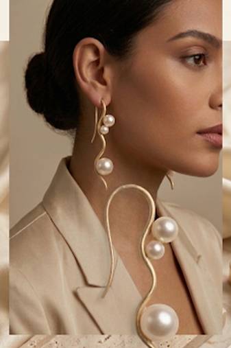 Gold plated serpentine pearl climber earrings