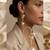 Gold plated serpentine pearl climber earrings