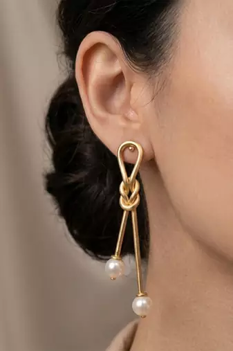 Gold plated gilded knot dangler earrings