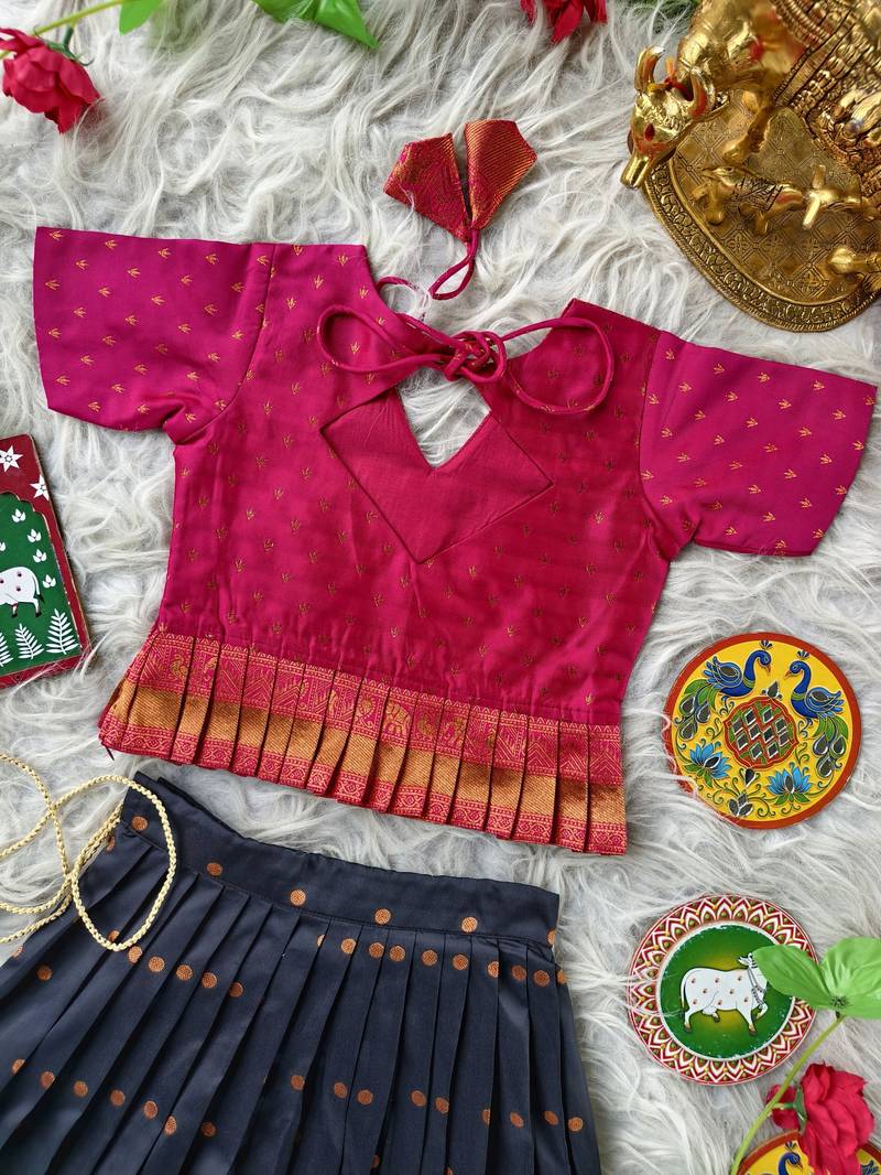 Beautiful ethnic skirt and top set featuring an elegant daaman design with intricate woven motifs