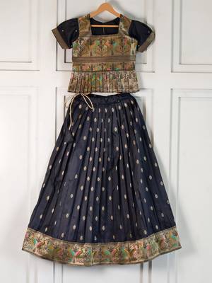 Black ethnic skirt and top set featuring an elegant border design with intricate woven motifs 1