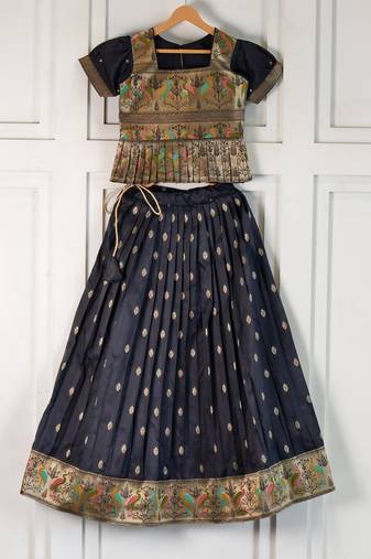 Black ethnic skirt and top set featuring an elegant border design with intricate woven motifs