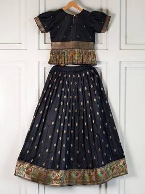 Black ethnic skirt and top set featuring an elegant border design with intricate woven motifs 2