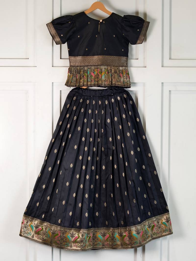 Black ethnic skirt and top set featuring an elegant border design with intricate woven motifs
